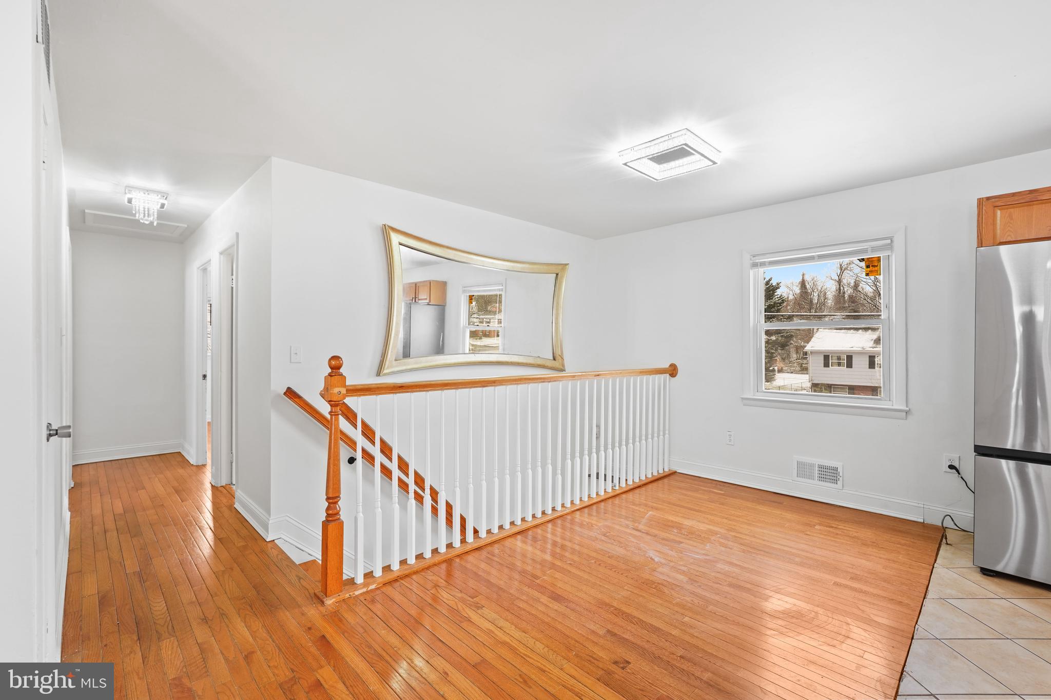 6903 Fawncrest Drive Capitol Heights, MD 20743 - Photo 13 of 36 a view of a hallway with windows