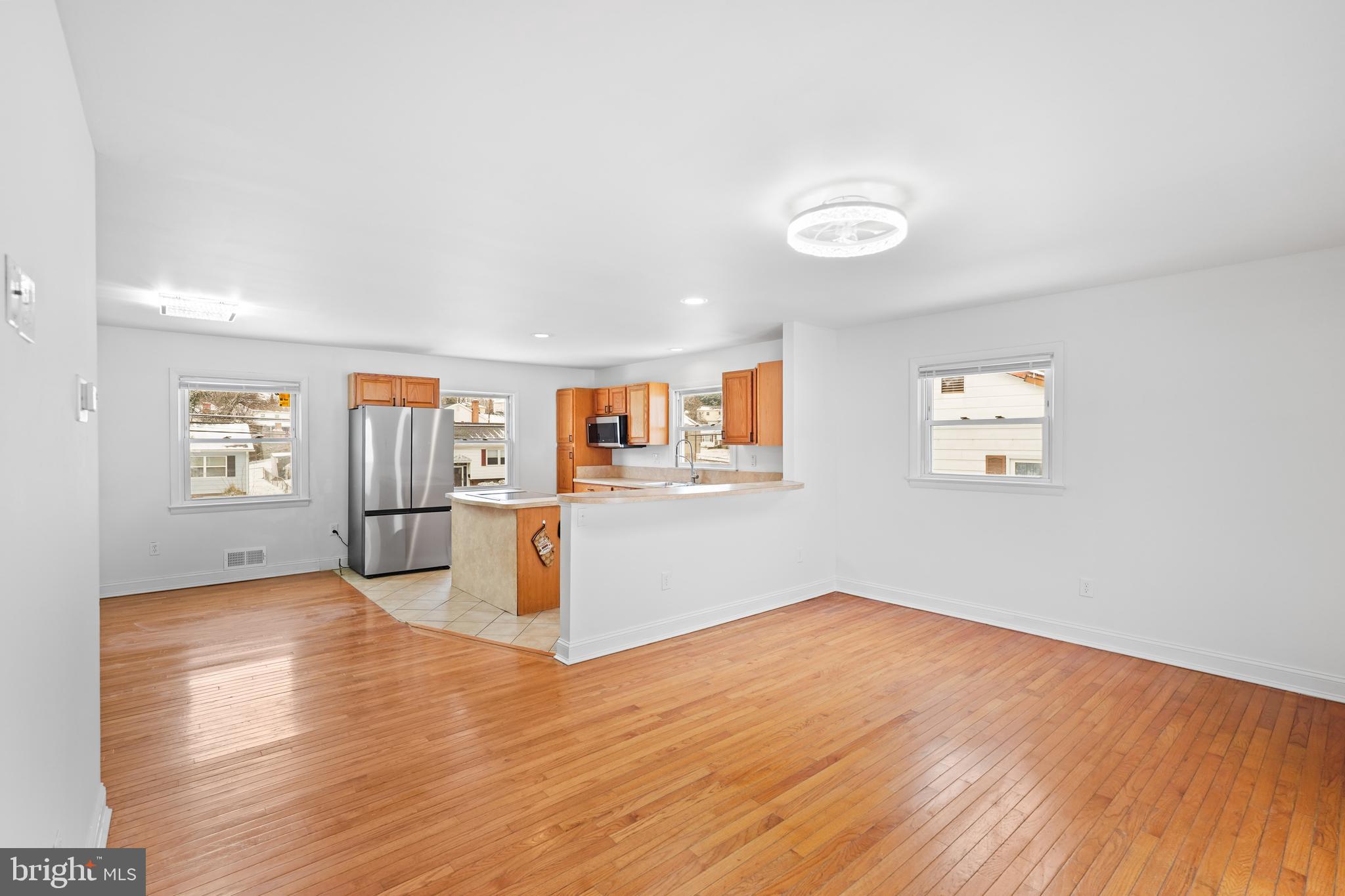 6903 Fawncrest Drive Capitol Heights, MD 20743 - Photo 14 of 36 a view of a room with wooden floor and window