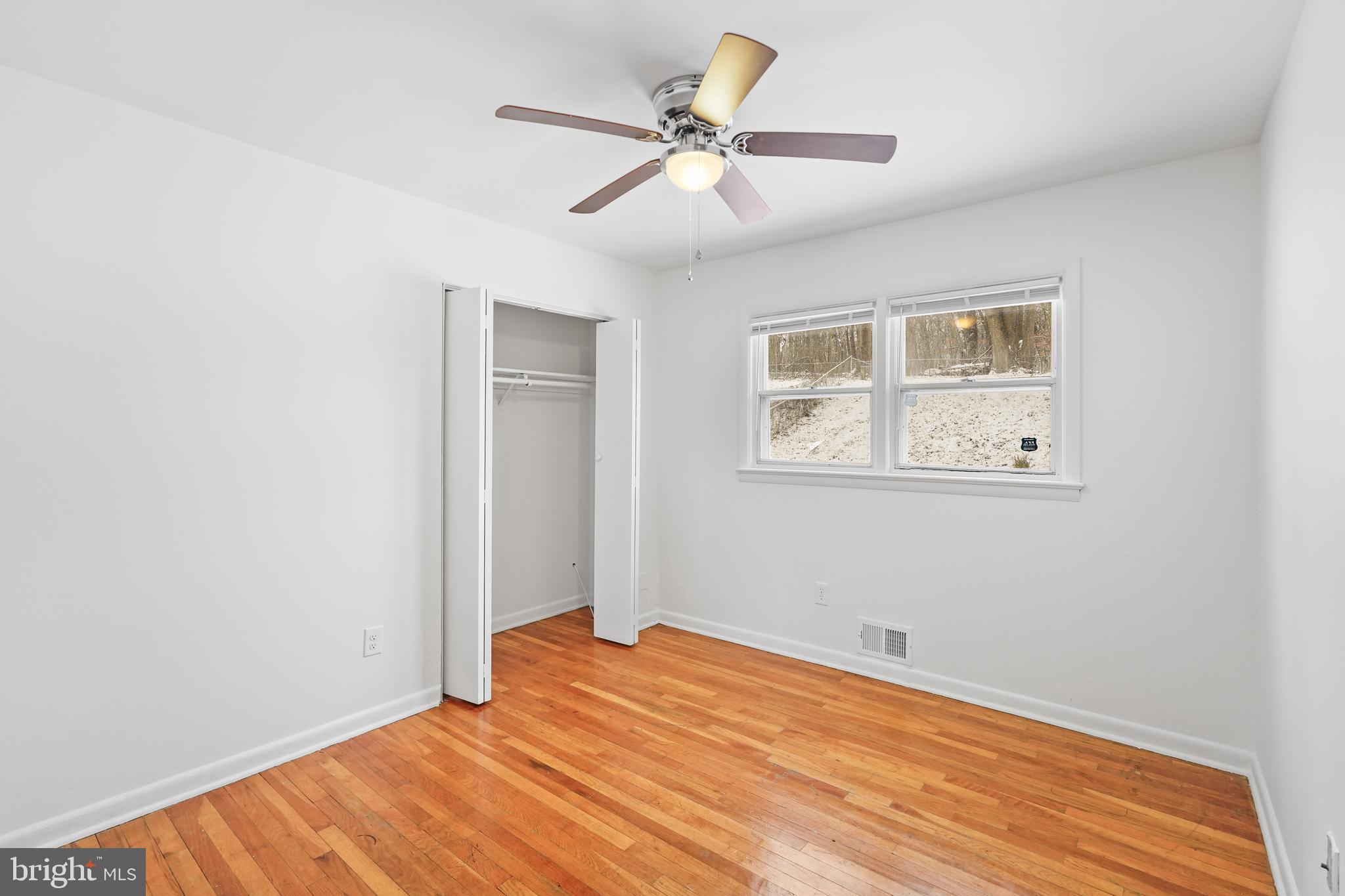 6903 Fawncrest Drive Capitol Heights, MD 20743 - Photo 25 of 36 a view of a room with wooden floor