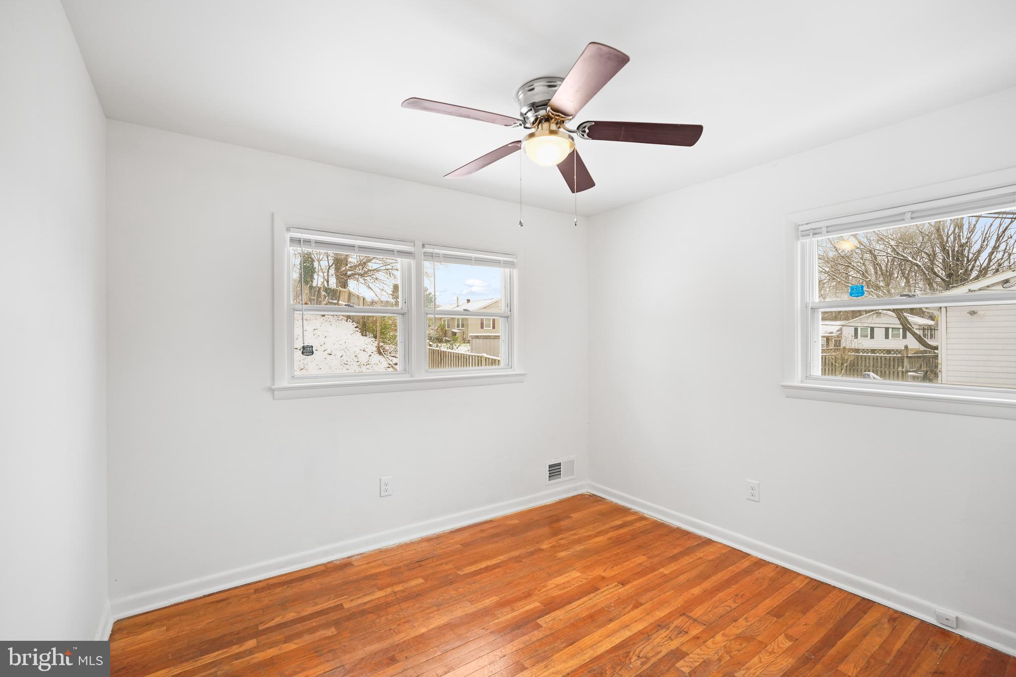 6903 Fawncrest Drive Capitol Heights, MD 20743 - Photo 26 of 36 a view of room with window and ceiling fan