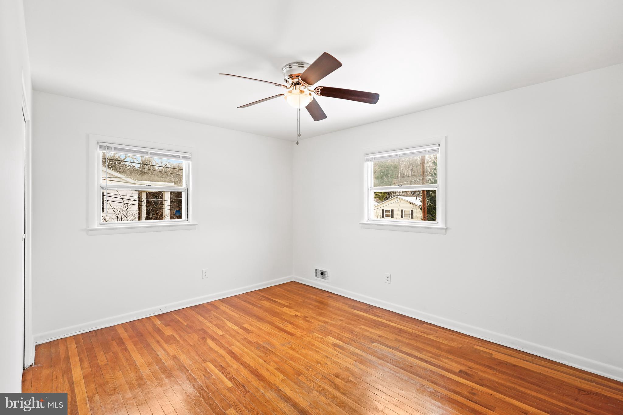 6903 Fawncrest Drive Capitol Heights, MD 20743 - Photo 28 of 36 a view of empty room with wooden floor