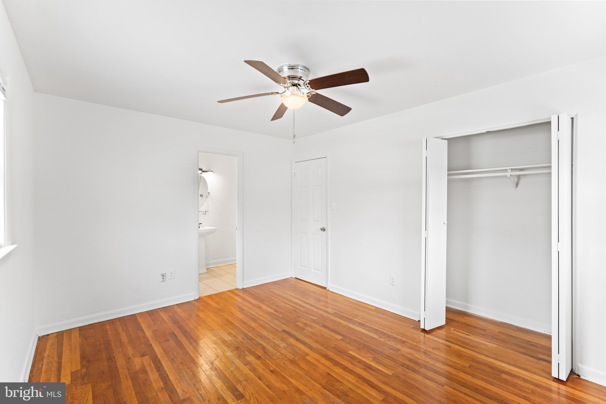 6903 Fawncrest Drive Capitol Heights, MD 20743 - Photo 29 of 36 a view of empty room with wooden floor