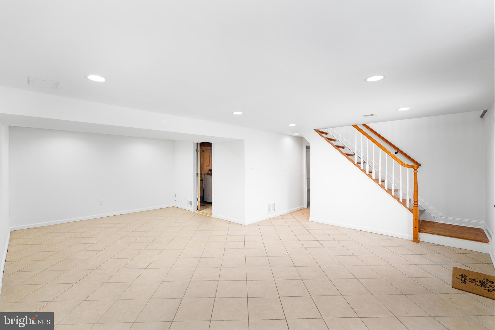6903 Fawncrest Drive Capitol Heights, MD 20743 - Photo 3 of 36 a view of an empty room with wooden floor