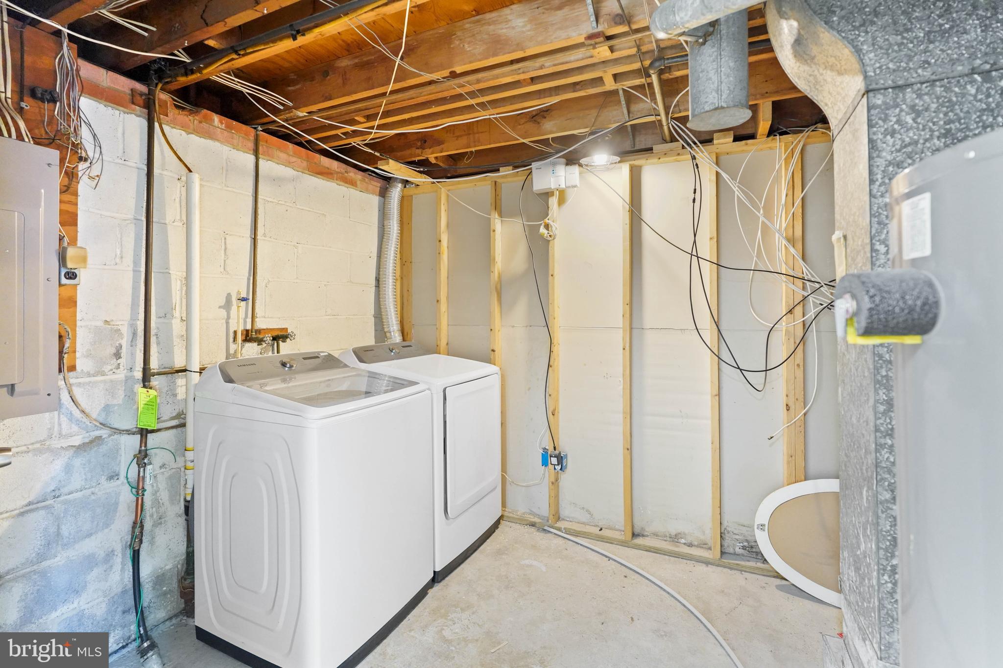 6903 Fawncrest Drive Capitol Heights, MD 20743 - Photo 33 of 36 a bathroom with a sink a mirror and next to a window
