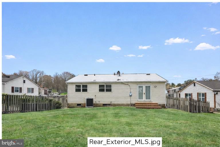 6903 Fawncrest Drive Capitol Heights, MD 20743 - Photo 35 of 36 a front view of a house with a yard