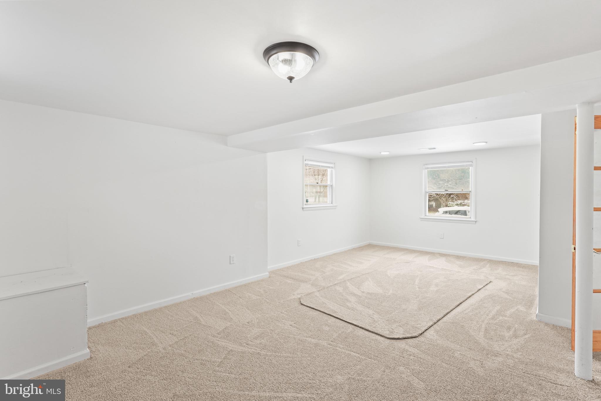 6903 Fawncrest Drive Capitol Heights, MD 20743 - Photo 8 of 36 a view of a room with hardwood floor and window