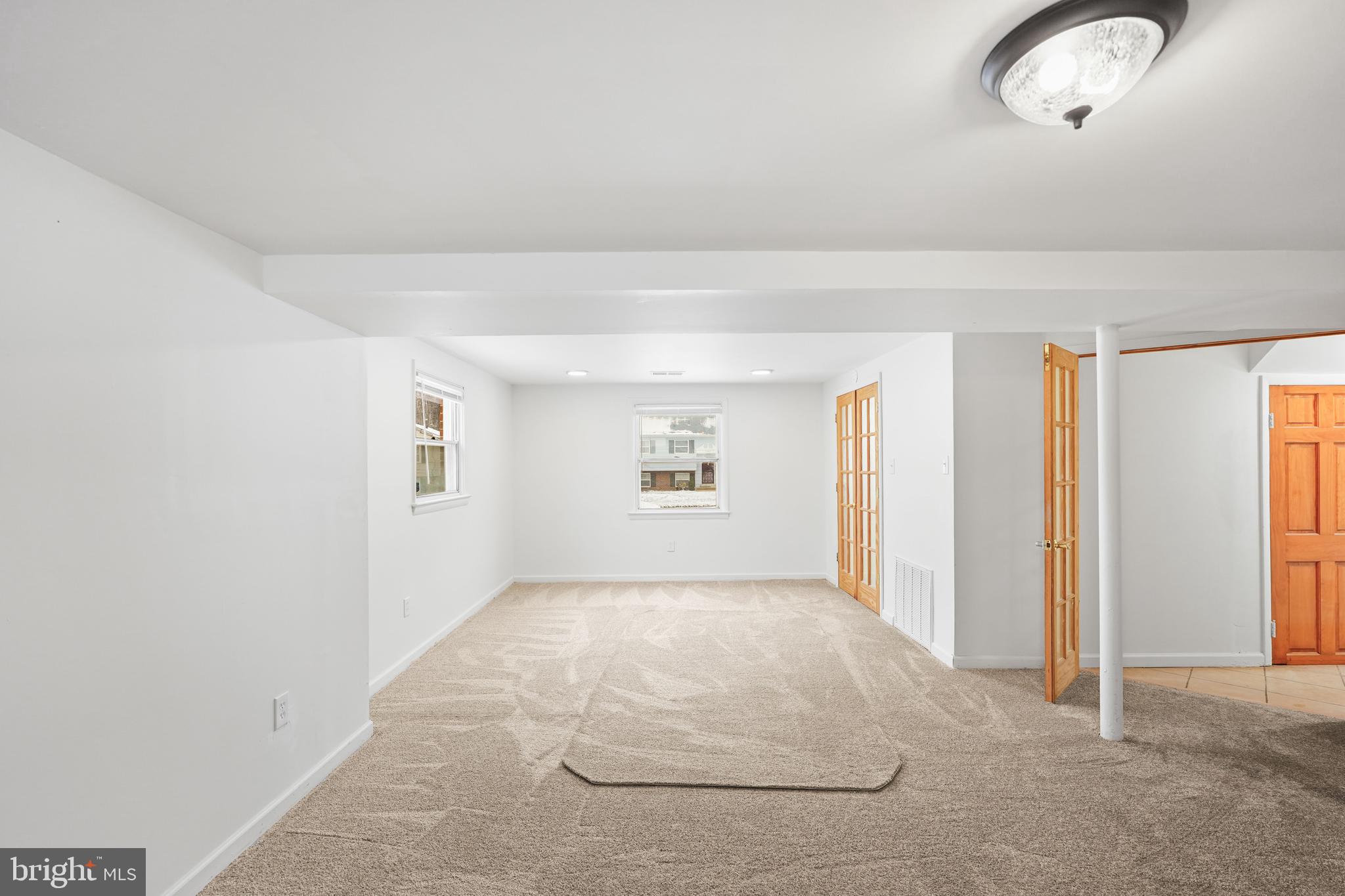 6903 Fawncrest Drive Capitol Heights, MD 20743 - Photo 9 of 36 an empty room with windows
