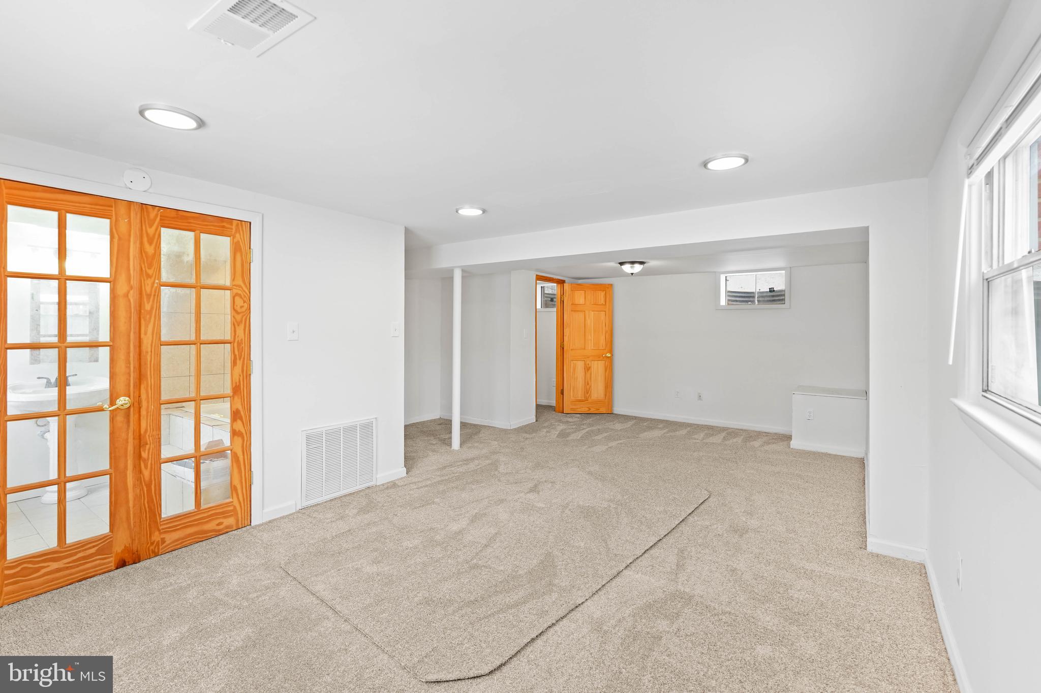 6903 Fawncrest Drive Capitol Heights, MD 20743 - Photo 10 of 36 an empty room with windows and closet