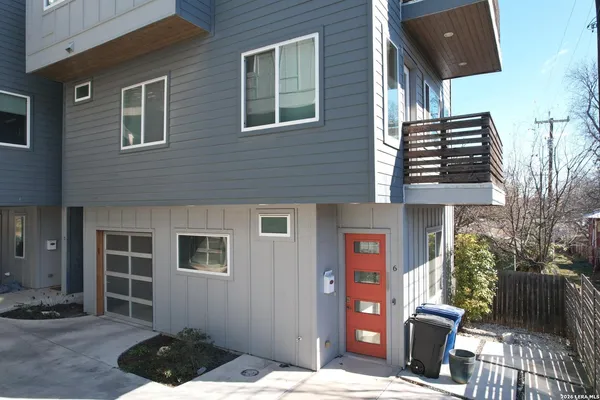a backyard of a house with seating space