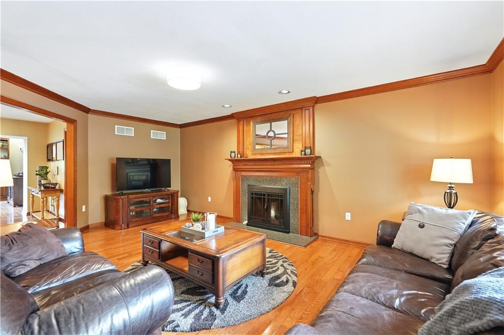 1751 Hassam Road Coraopolis, PA 15108 - Photo 18 of 50 a living room with furniture and a fireplace