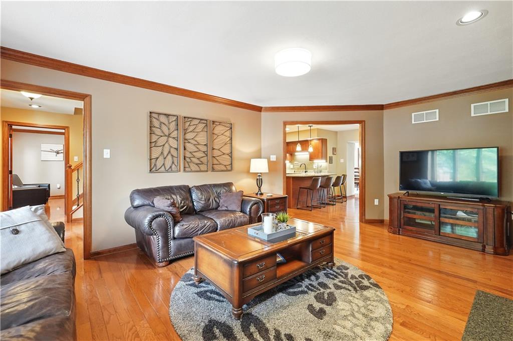 1751 Hassam Road Coraopolis, PA 15108 - Photo 19 of 50 a living room with furniture and a flat screen tv