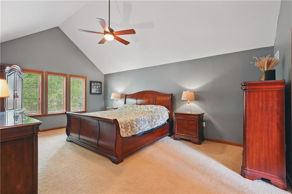 1751 Hassam Road Coraopolis, PA 15108 - Photo 32 of 50 a bedroom with a large bed and a chandelier