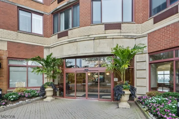 a view of a building with a potted plant