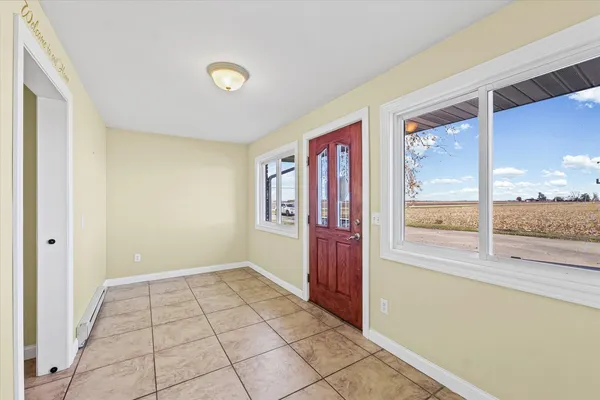 a view of an empty room and window