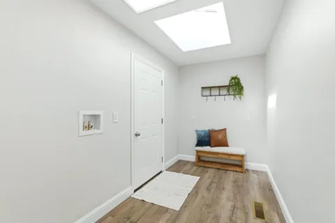 a view of a livingroom with lounge chair