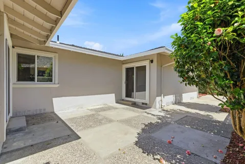 a view of a house with a patio