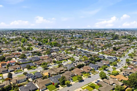 an aerial view of a city with lots of residential buildings