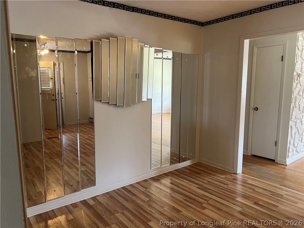 1007 Lisa Circle Spring Lake, NC 28390 - Photo 10 of 19 Mirror accent wall in dining space