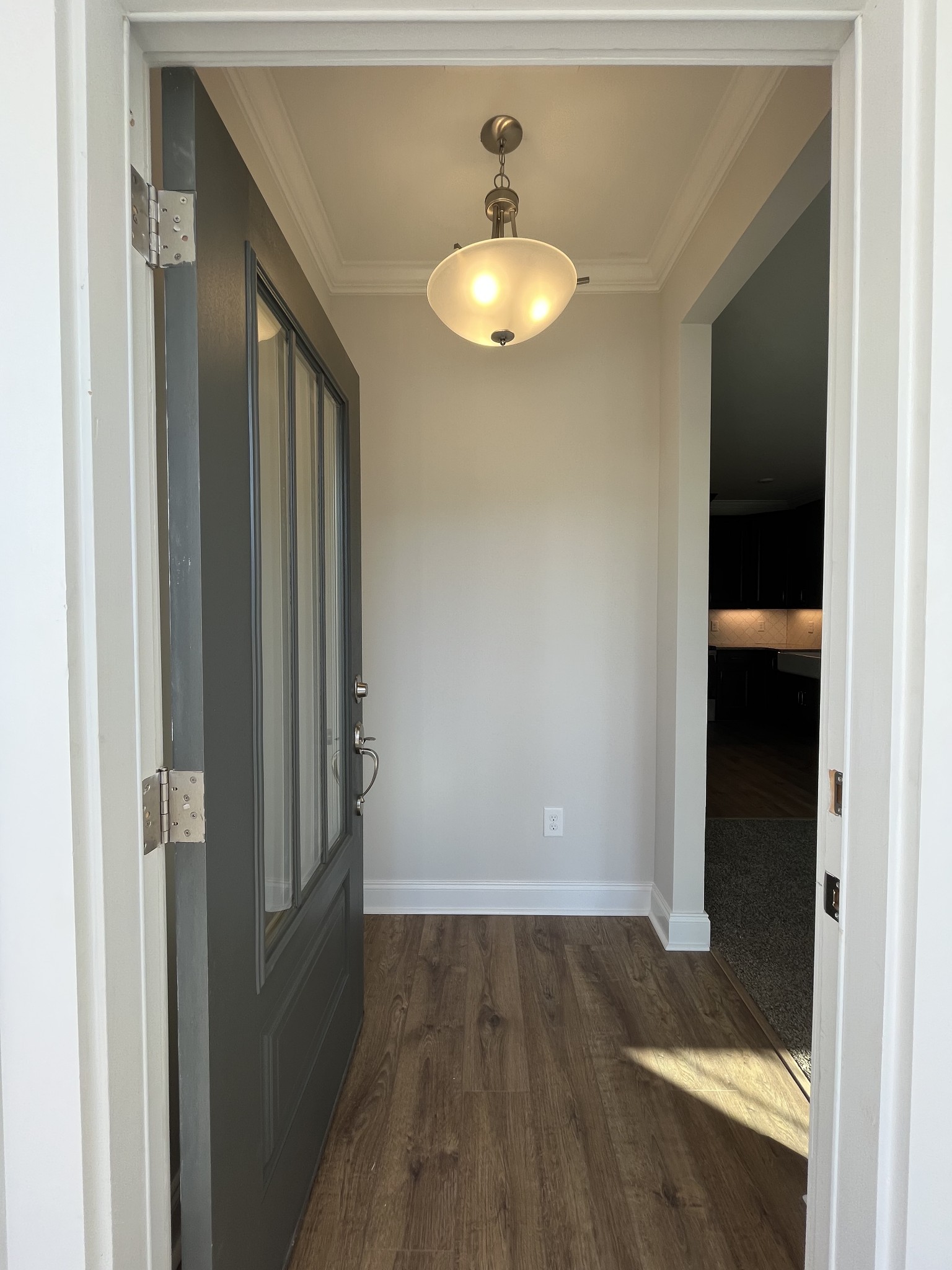 3267 Tasker Drive Antioch, TN 37013 - Photo 3 of 44 a view of a hallway with wooden floor and closet