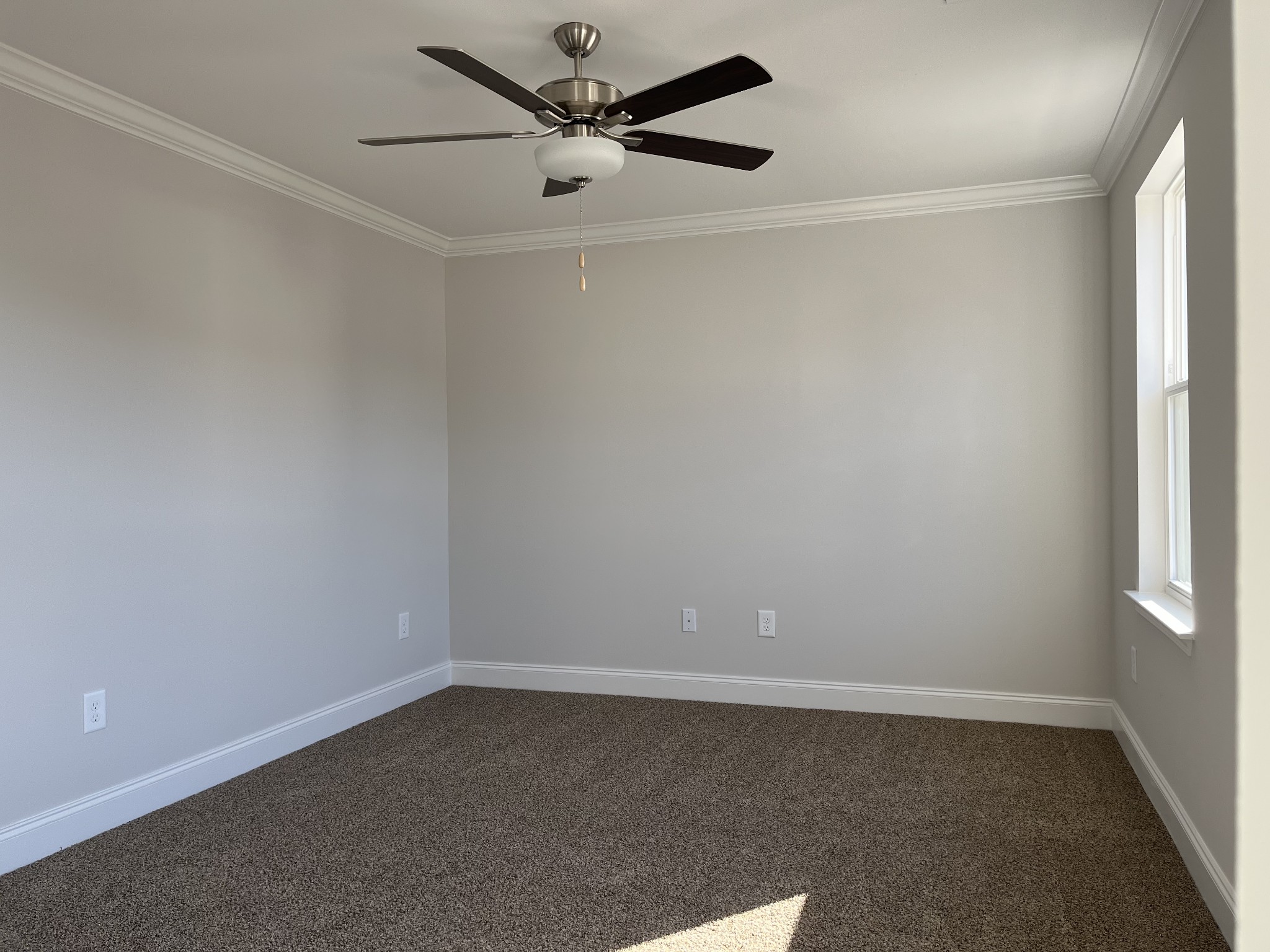 3267 Tasker Drive Antioch, TN 37013 - Photo 34 of 44 an empty room with a window and a fan