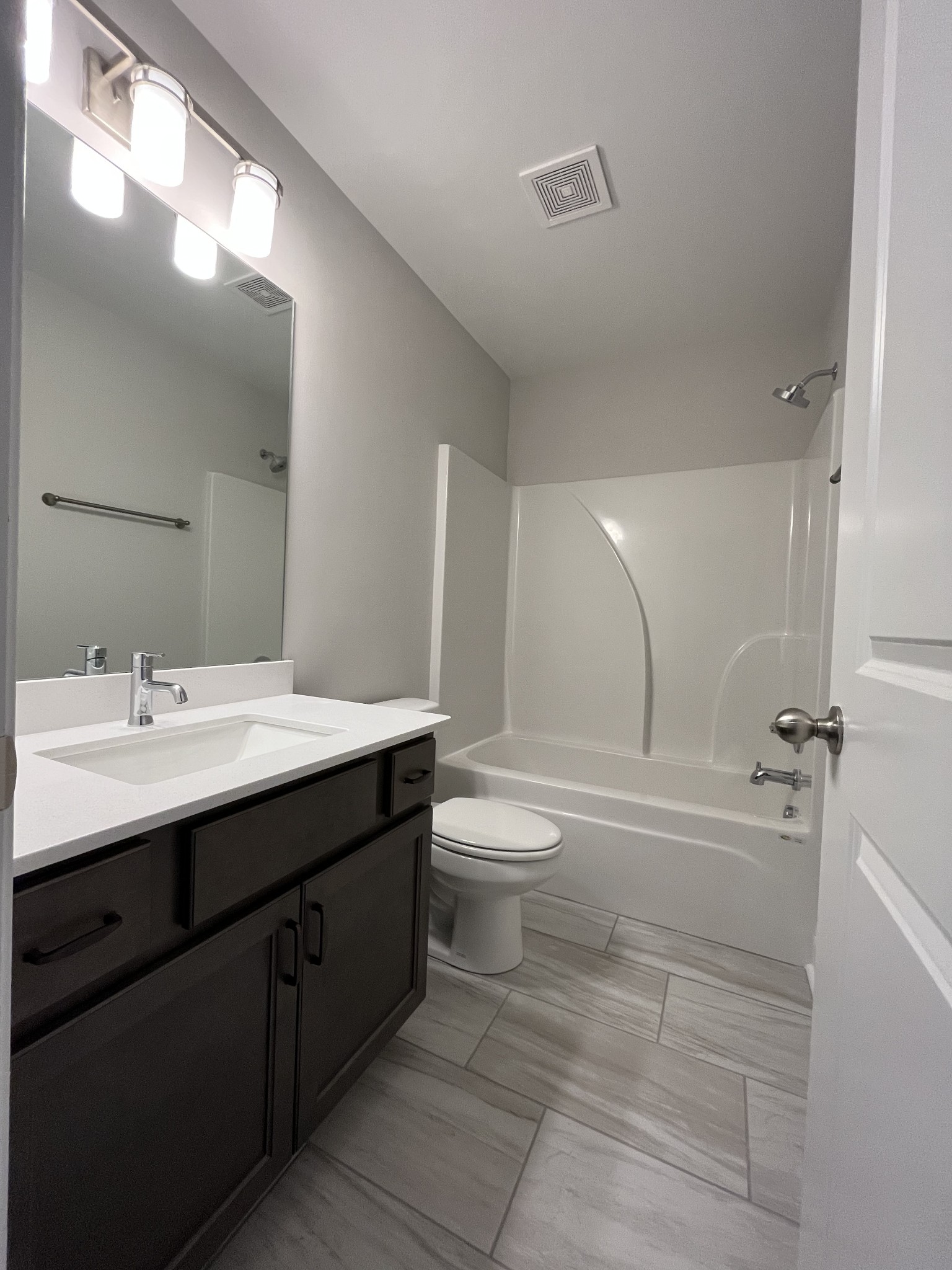 3267 Tasker Drive Antioch, TN 37013 - Photo 37 of 44 a bathroom with a sink toilet and shower