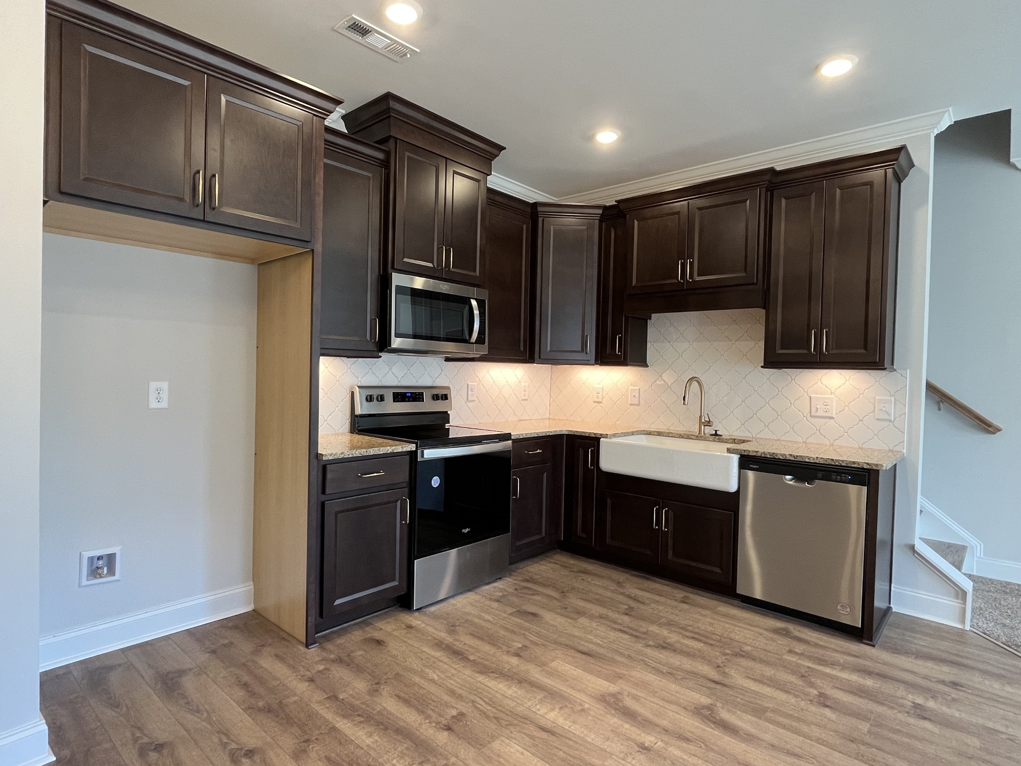 3267 Tasker Drive Antioch, TN 37013 - Photo 4 of 44 a kitchen with stainless steel appliances granite countertop a refrigerator and a sink