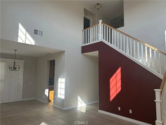 a view of entryway and hall with a window