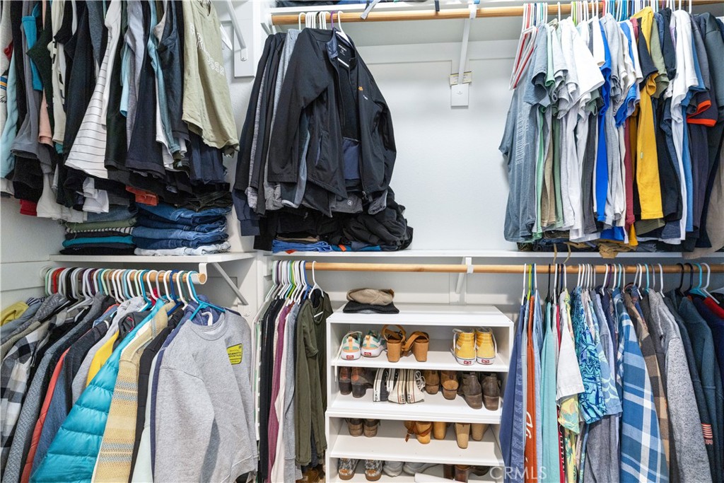 9354 Riberena Circle Atascadero, CA 93422 - Photo 40 of 47 a view of walk in closet with clothes and shoes