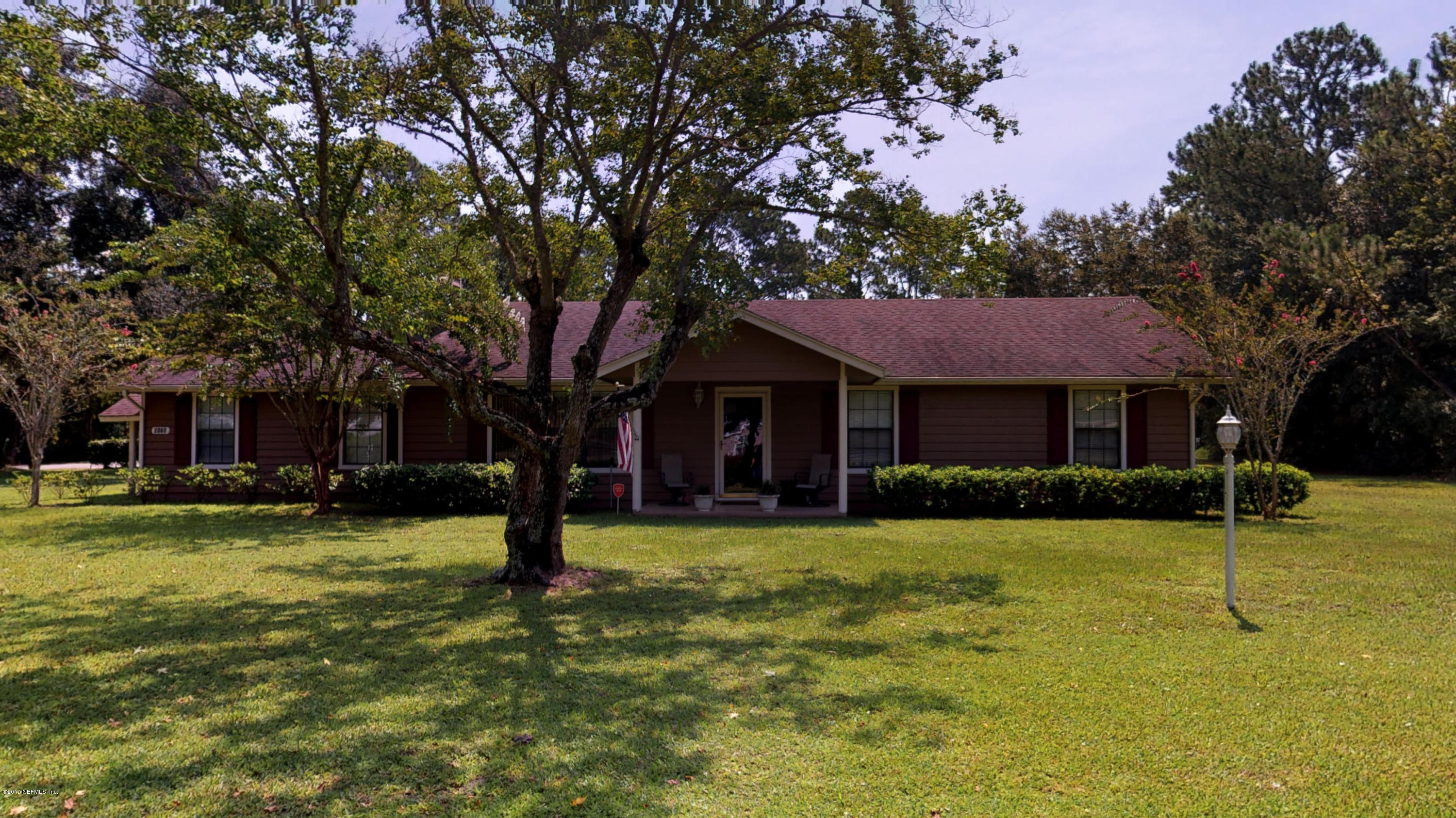 5175 Scaff Road St. Augustine, FL 32092 - Photo 1 of 20 a view of a house with swimming pool and a yard