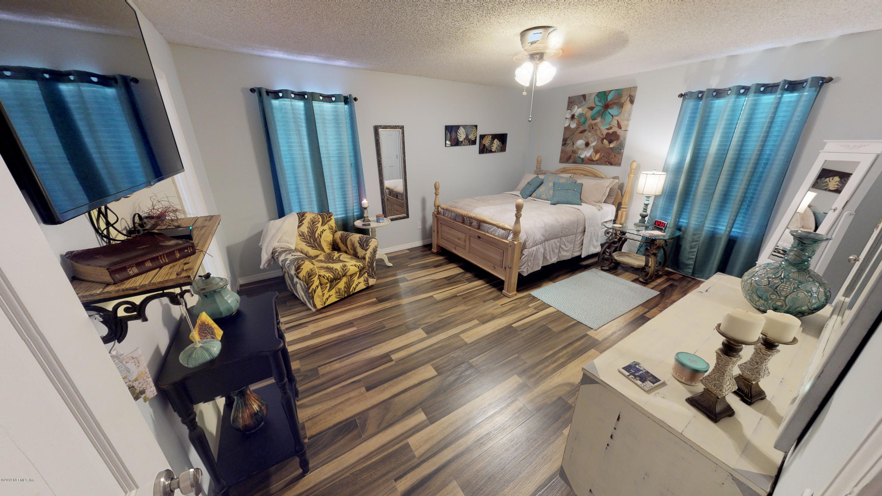 5175 Scaff Road St. Augustine, FL 32092 - Photo 11 of 20 a bedroom with furniture and a window