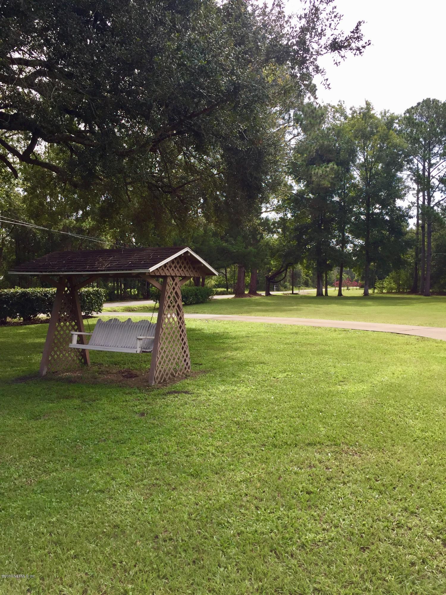 5175 Scaff Road St. Augustine, FL 32092 - Photo 3 of 20 a view of a field with sitting area
