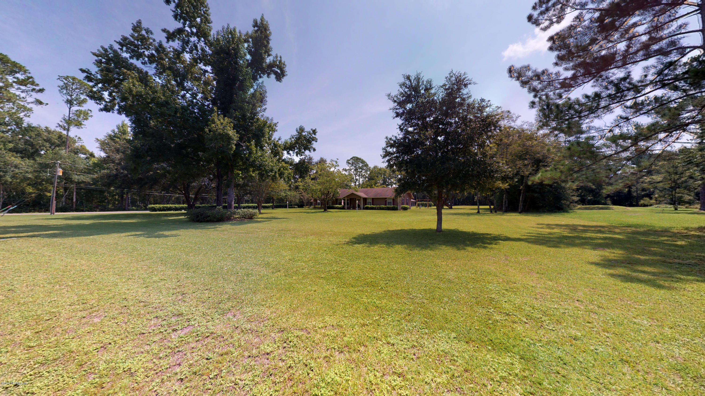 5175 Scaff Road St. Augustine, FL 32092 - Photo 8 of 20 a view of a swimming pool with a bench