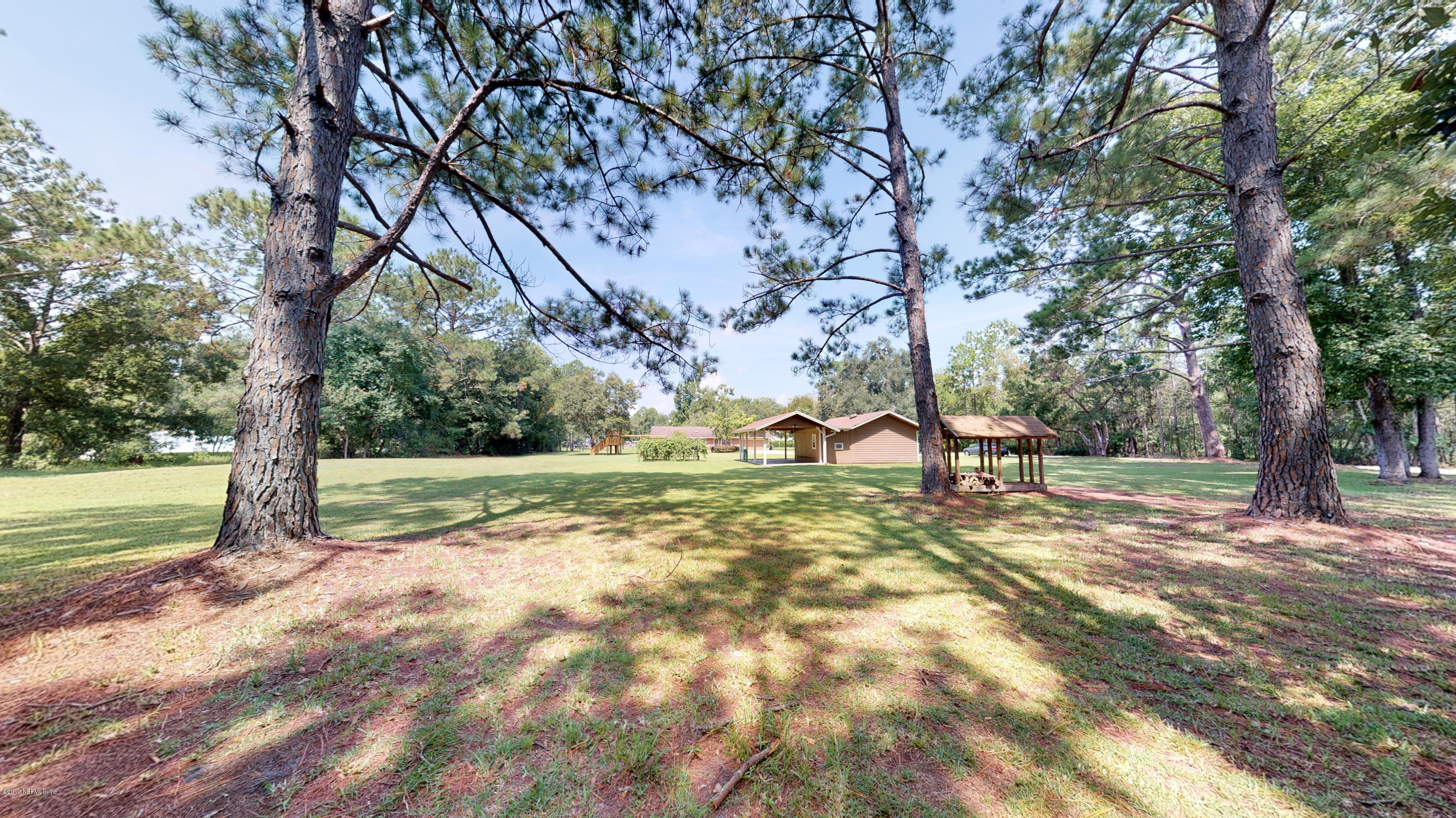 5175 Scaff Road St. Augustine, FL 32092 - Photo 9 of 20 a view of outdoor space with trees