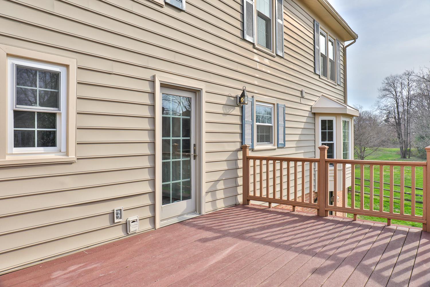 5423 Rilian Court Burke, VA 22015 - Photo 10 of 67 a view of a house with a door and wooden floor