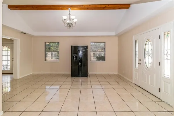 a view of an empty room and window