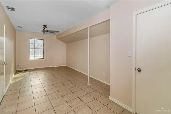 a view of an empty room with window