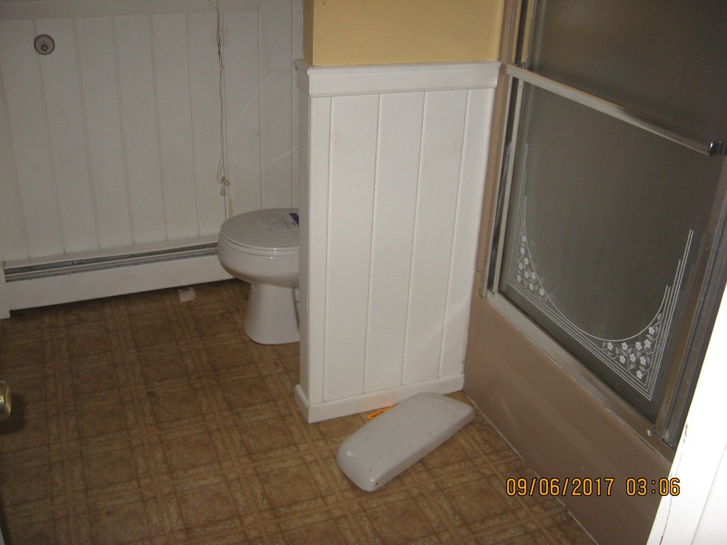 131 Dudley Road Templeton, MA 01468 - Photo 8 of 8 a bathroom with a toilet and a shower