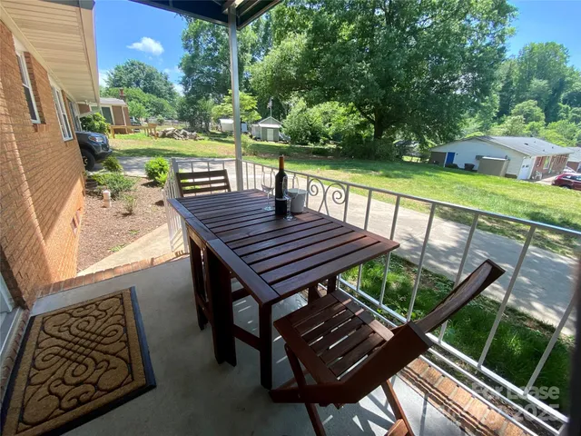 a view of a chairs on the deck