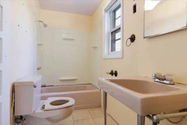 a bathroom with a sink and a bathtub