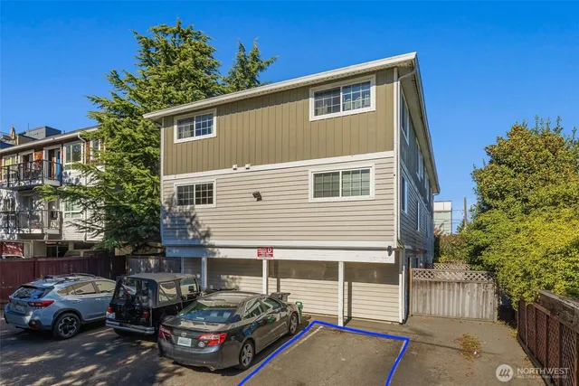 a car parked in front of a house