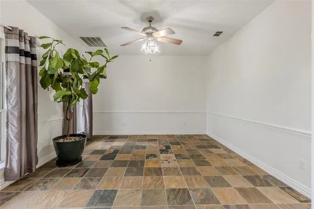a vase of flowers sitting on a table
