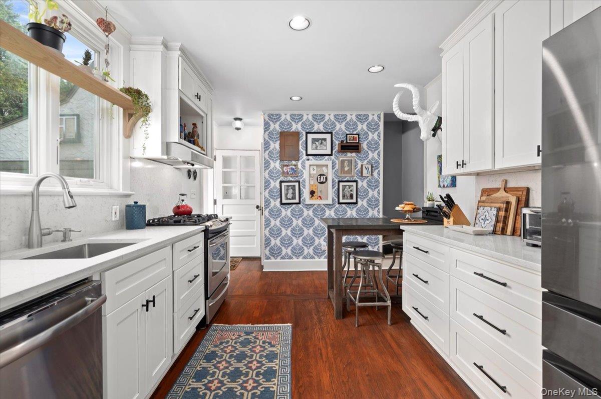 400 Manor Ridge Road Pelham, NY 10803 - Photo 16 of 39 a kitchen with stainless steel appliances sink stove and cabinets