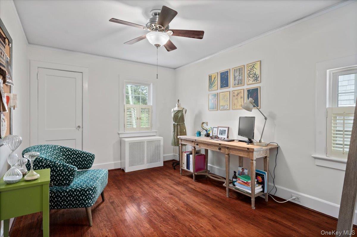 400 Manor Ridge Road Pelham, NY 10803 - Photo 25 of 39 a workspace with furniture window and wooden floor