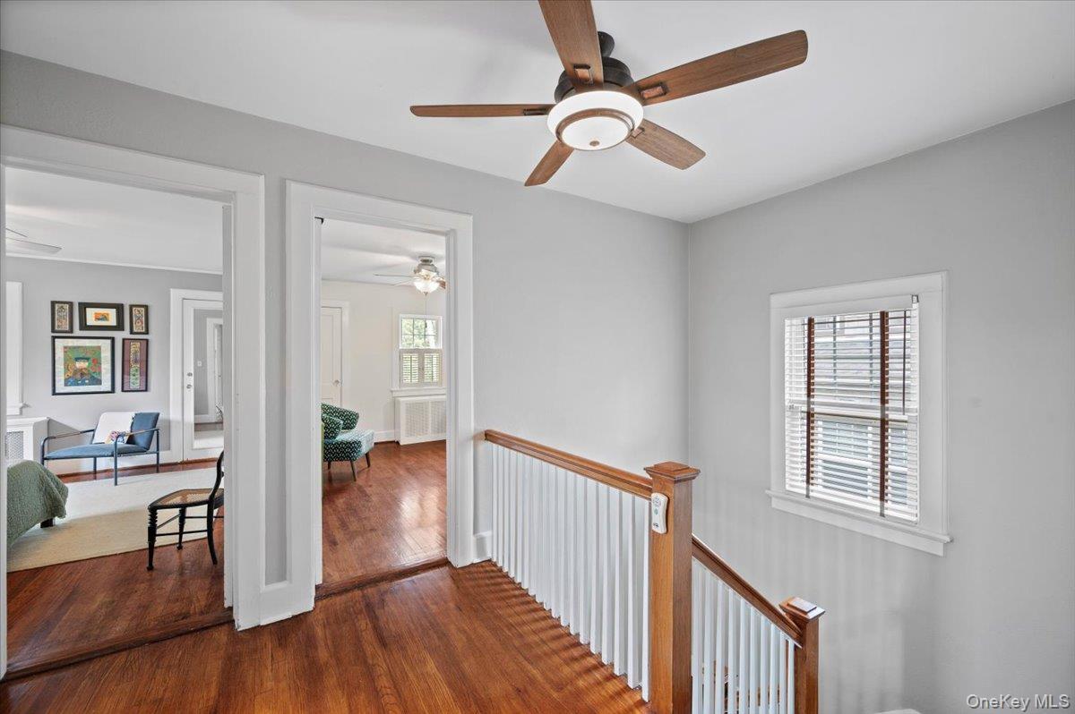 400 Manor Ridge Road Pelham, NY 10803 - Photo 26 of 39 a view of a hallway with wooden floor and workspace
