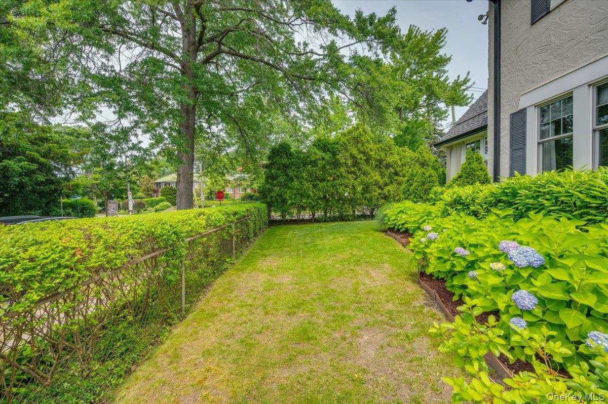 400 Manor Ridge Road Pelham, NY 10803 - Photo 35 of 39 a view of yard with swimming pool and green space
