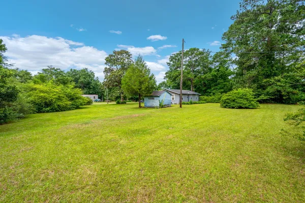 a house view with a garden space