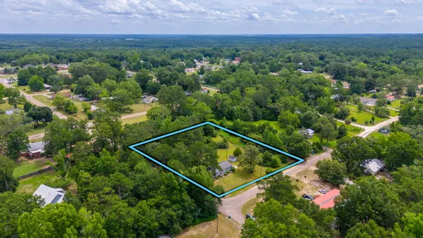a view of yard with swimming pool and outdoor space