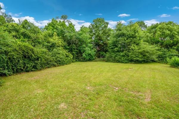 a view of a field with an empty space