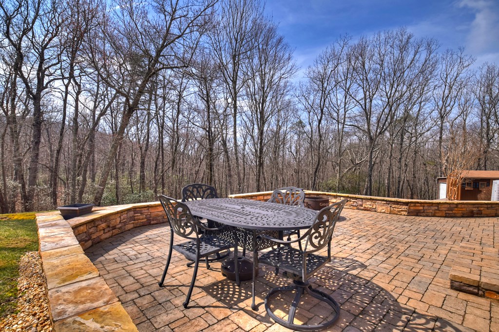 1950 St. Andrews Way Jasper, GA 30143 - Photo 35 of 91 Large open patio on back of home to enjoy the wood