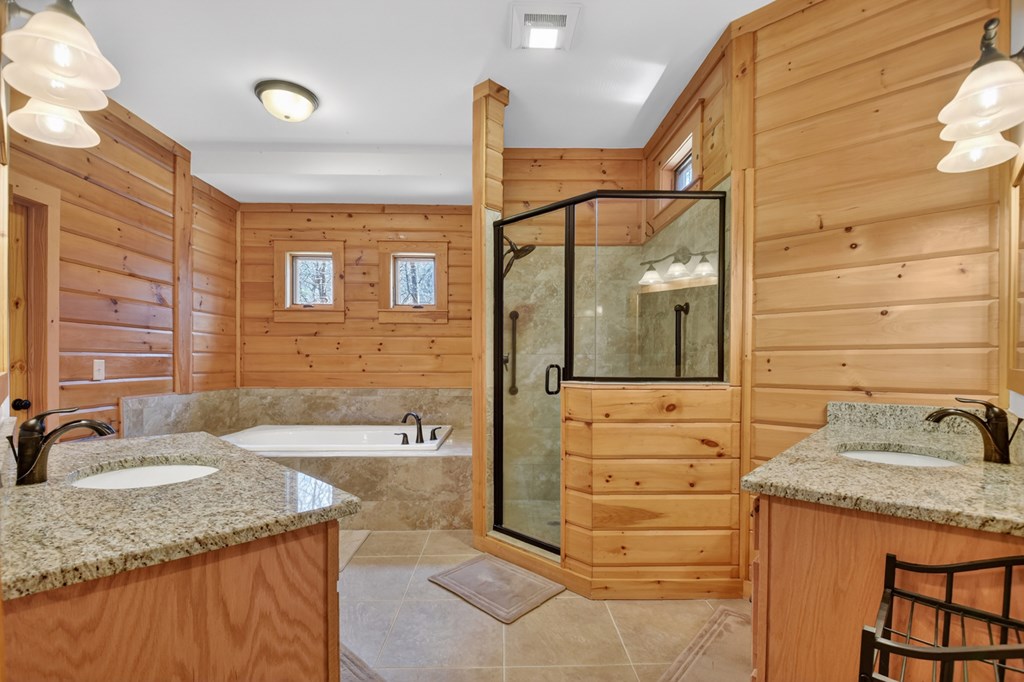 1950 St. Andrews Way Jasper, GA 30143 - Photo 47 of 91 Large master ensuite bath with soaking tub and sep